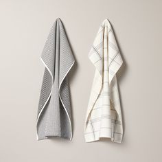 two folded towels sitting next to each other