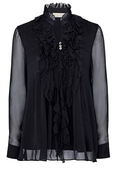 Beautifully feminine, elegant and timeless in style, this 100% silk ruffle top with soft jersey back and lining, features luxurious touches including long sheer sleeves, and pretty cascading ruffles falling down the neckline for a glamorous, flattering and textured look.  Pair with jeans and boots for a more casual style, or glam up with a skirt or smart trousers for the ultimate party look.  Set to be a favourite for years to come, whatever the season. Details:  100% Silk shell and sleeves Soft Black Ruffle Blouse, Wardrobe Makeover, Cascading Ruffles, Smart Trousers, Party Look, Black Ruffle, Party Looks, Falling Down, Sheer Sleeves