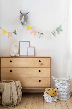 The calm and collected nature of a gray room calls for a dresser that can match its poise. We'll cover nine color ideas for dressers that can either stand out or blend in with your gray decor. Dresser Top Organization, Christmas Whale, Navy Blue Furniture, Top Of Dresser, Inspirational Quotes Decals, Dresser Organizer, Colorful Dresser, Christmas Gift Baby, Green Dresser