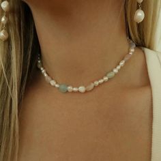 This Bonbon pearl necklace is the perfect accessory for a sunny day. Its colorful array of pastel gemstones & lustrous pearls will bring a sweet and airy style to any ensemble. 14.75” in length Freshwater pearls, morganite, rose quartz, blue lace agate, amethyst and gold filled components. All stones and pearls are natural in shape and will vary on each necklace. Feminine Pearl Beaded Necklaces, Blue Lace Agate, Lace Agate, Sunny Day, Morganite, Blue Lace, Jewelry Care, Rose Quartz, Freshwater Pearls