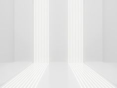 an empty white room with vertical lines on the wall