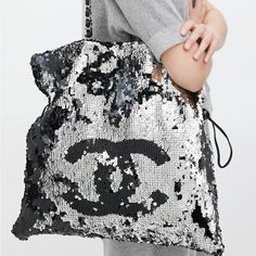 Chanel Sequin Bag -Black & Silver Sequin -Drawstrings At Side **Excellent Condition Vs Luxury Metallic Silver Bags For Party, Luxury Metallic Silver Party Bag, Luxury Metallic Silver Party Bags, Luxury Silver Shoulder Bag With Dust Bag, Luxury Black Sequined Bags, Designer Silver Shoulder Bag For Party, Designer Silver Shoulder Bag With Dust Bag, Luxury Silver Shoulder Bag For Shopping, Silver Tote Bag For Party