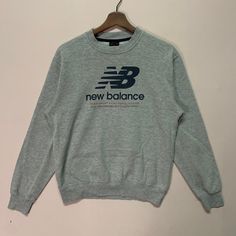 PLEASE READ DESCRIPTION FIRST BEFORE BUYING‼️‼️ New Balance Big Logo Sweatshirt  ( Please refer measurement below ) *MEASUREMENT Armpit to armpit : 20 inches Length from top to buttom : 24 inches Sleeve length : 19.5 inches *CONDITION All in good condition No hole No Stain *MATERIAL Cotton *SHIPPING 🔥 We ship to worldwide with a tracking number. - All item will ship from Malaysia and will be ship by post Malaysia ( Flexipack ) - All item will be shipped out within 2-3 business days ( handling t New Balance Sweatshirt, Heather Grey Crew Neck Sportswear Sweatshirt, Heather Grey Crew Neck Sweatshirt For Sportswear, Heather Grey Crew Neck Sweatshirt, Casual Athletic Heather Tops With Ribbed Cuffs, Basic Winter Tops With Logo Print, Casual Tops With Ribbed Cuffs In Athletic Heather, Casual Sweatshirt With Logo Print In Athletic Heather, Casual Sweatshirt In Athletic Heather With Logo Print