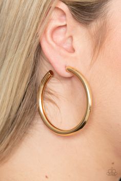 A thick gold bar delicately curls into a glistening oversized hoop for a retro look. Earring attaches to a standard post fitting. Hoop measures approximately 2 1/4" in diameter.

 Sold as one pair of hoop earrings. Paparazzi Accessories Jewelry, Earrings Aesthetic, Easy Jewelry, Paparazzi Accessories, Silver Bars, Paparazzi Jewelry, Gold Bar, Earring Sale, Retro Look