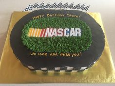 a birthday cake with the name nascar on it