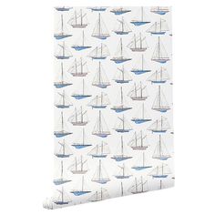 a wallpaper with sailboats on it in blue and white, against a white background