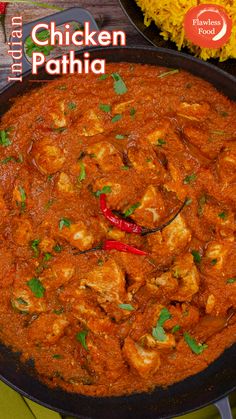 chicken patiya in a skillet with rice on the side