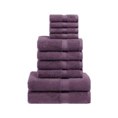 stack of purple towels on white background