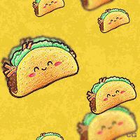 some tacos with faces drawn on them