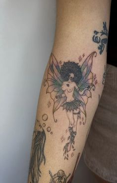 black fairy afro fairy tattoo tat tats black girl tattoos Black Fairy Tattoo, Armband Tattoos, Cross Tattoos For Women, Fairy Tattoo Designs, Tattoos For Women Half Sleeve, Small Pretty Tattoos, Black Fairy