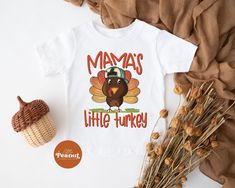 "Get your kid ready for the Thanksgiving celebrations! Our Mama's Little Turkey shirt is just what you need to put him in the spirit of Fall. This shirt is not only adorable but also soft and comfy for your little one. Buy this perfect Thanksgiving shirt for your little guy today, and let him be the cutest turkey at the dining table! Mama's Little Turkey Kids Shirt - Thanksgiving Toddler Shirt - Cute Fall Shirt - Fall Toddler Shirt - Boys Thanksgiving Turkey Shirt ► SHIRT DETAILS: ☆ We use 100% Toddler Thanksgiving Shirts, Toddler Thankful Shirt, Thanksgiving Tshirt For Boys, Toddler Life Thanksgiving Shirt, Toddler Thanksgiving Shirt, Little Turkey Thanksgiving Shirt, Thanksgiving Toddler, Turkey Shirts, Toddler Fall