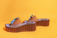 "Fabulous pair of Y2k DKNY blue sandals that are jelly, slip on style, platform and has a blue ribbon in the middle.  ➽ tag: DKNY ➽ material: jelly ➽ condition: great shape ➽ size: medium / 7 approximately but size not listed ➽ measures: sole width 3\" / sole length 10\" / shoe height 2 1/2\" / heel height 4\" ➽ Apple Branches Vintage applebranchesvintage.etsy.com instagram.com/applebranchesvtg" Trendy Slip-on Platform Jelly Sandals, Summer Platform Slip-on Jelly Sandals, Trendy Platform Slip-on Jelly Sandals, Red High Waisted Pants, Flower Swimsuit, Bright Shorts, Sandals Vintage, Yellow Bodysuit, Studded Jeans