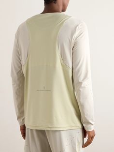 Swiss performance meets Korean minimalism in ON's collaborative capsule with Post Archive Faction. , This performance T-shirt is cut from smooth, lightweight recycled-jersey and panelled with breathable mesh for optimal airflow , Bonded seams minimise friction and improve comfort , Reflective logos keep you visible in low-light conditions White Compressive Long Sleeve Tops, Green Compressive Training Tops, Green Compressive Tops For Training, Functional Tops For Light Sports With Relaxed Fit, Functional Crew Neck Tops For Light Sports, Functional Crew Neck Training Tops, Functional Tops With Relaxed Fit For Light Sports, Functional Relaxed Fit Tops For Light Sports, Functional Go-dry Tops For Light Sports