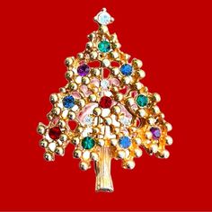 VINTAGE Signed Eisenberg Christmas Tree Brooch Costume Jewelry from a private collection/never worn. Red, blue, green, purple and white Rhinestone.  Brilliant GoldTone  Like new MID CENTURY CHRISTMAS JEWELRY Jewelry Christmas Tree, Mid Century Christmas, Old Jewelry, White Rhinestone, Red Blue Green, Purple And White, Christmas Jewelry, Jewelry Vintage, Vintage Signs