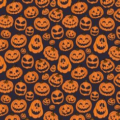 a lot of pumpkins that are on a black background with orange and green faces