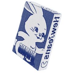 a blue and white sticker with an image of a rabbit holding a toothbrush