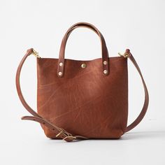 Leather Tote Bag: Cypress Mini Tote | leather bags by KMM & Co. Classic Everyday Shoulder Bag In Oiled Leather, Everyday Oiled Leather Satchel Shoulder Bag, Oiled Leather Shoulder Satchel For Everyday, Everyday Oiled Leather Shoulder Satchel, Everyday Satchel With Oiled Leather And Leather Lining, Everyday Brown Oiled Leather Satchel, Classic Everyday Shoulder Bag In Vegetable Tanned Leather, Classic Vegetable Tanned Leather Shoulder Bag For Everyday, Everyday Cognac Shoulder Bag With Smooth Grain