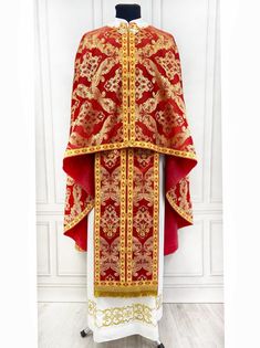 Celebrate the sacred traditions with our luxurious red and gold Orthodox vestments, meticulously designed for clergy. This complete priest set exudes elegance and reverence, making it ideal for church services, especially during the Christmas season. Crafted with high-quality fabrics, these vestments offer comfort and longevity. Whether for regular church attire or festive occasions, this set will make a thoughtful and meaningful gift for priests or clergy members. Vestments made of church fabric  The set includes: Phelon, epitracheal, armbands, belt, roofing 3pcs, the stichar is not included. Size: 131 cm / 51.5 inch length of the main product Length according to the client's needs (+ to the cost by agreement) A complete set of Orthodox clerical vestments carefully crafted to meet the cer Luxury Embroidered Red Vestments, Luxury Red Sets For Traditional Ceremonies, Luxury Traditional Chasuble For Ceremonies, Orthodox Vestments, Priestly Garments, Priest Robes, Church Attire, Church Service, Orthodox Church