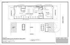 the floor plan for an office building with two cars parked in front of it and one car