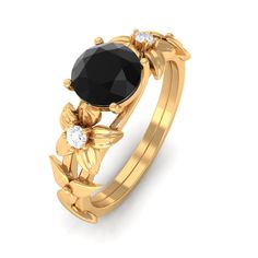 Product Details Designed with elegance and charm, this Black Onyx Solitaire Ring with Diamond adds a flair of sophistication and charm to your everyday style. Product Information SKU SHP-RINGS032218651 Width 5 mm Height 6 mm Weight 3.20 gm (Approximate) BLACK ONYX INFORMATION No.of Stones 1 Pieces Total Weight 1.20 Carat (Approximate) Dimension(approx) Round-7X7 mm-1 Pcs Color Black Cut Brilliant Shape Round Setting Type Prong-Setting Quality Grade AAA DIAMOND INFORMATION No.of Stones 2 Pieces T Floral Ring, Ring With Diamond, Black Onyx Ring, 18k Yellow Gold Ring, Onyx Ring, Yellow Gold Rings, Solitaire Ring, Everyday Style, Black Onyx