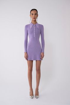 She's back and in a brand new color: the lurex mini polo dress, donning our signature, oversized, pointed collar, fit 'n flare shape, and ribbed stitch, now available in a soft violet. Isn't she perfect for your most flirtiest of soirees? Also available in Honeydew and Pink. Content: 75% viscose, 8% metal, 20% lycra. Model is 5' 9,5" and wearing size XS. View our size chart, shipping, and returns policy here. Chic Fitted Mini Dress With Collared Neckline, Fitted Party Dress With Collared Neckline, Fitted Collared Shirt Dress For Winter, Winter Collared Fitted Shirt Dress, Fitted Shirt Dress With Collared Neckline For Fall, Spring Mini Dress With Fitted Collared Neckline, Spring Mini Dress With Collared Neckline And Fitted Design, Fitted Collared Mini Dress For Work, Elegant Fitted Polo Dress With Collared Neckline