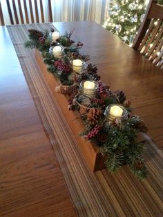 Table centerpiece I made today(My hubby made the wooden box for me). Winter Table Centre Pieces, Long Box Christmas Centerpiece, Rectangular Wooden Box Centerpiece, Christmas Centerpiece Box Ideas, Wooden Christmas Centerpieces, How To Decorate Wooden Boxes, Table Box Centerpiece, Box Centerpiece Ideas, Holiday Centerpieces For Tables