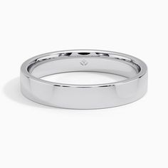 a white gold wedding ring on a white background