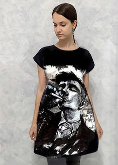 THOMAS SHELBY FROM PEAKY BLINDERS printed on a short shift dress. Back of the dress is cotton jersey fabric. Printed front is polyester,non-stretchable, 240 g/m2. This item can be ordered with 3/4 or long sleeves,just add a note to your order. Short Shift Dress, Peaky Blinders Tommy Shelby, Tommy Shelby, Dress Back, Cotton Jersey Fabric, Thomas Shelby, Peaky Blinders, Jersey Fabric, Shift Dress