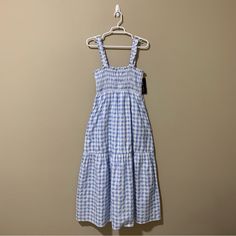 French Connection Gingham Smocked Midi Dress -Size 8 -Light Blue/White -Gingham -Lightweight -Pullover -Square Neck -Smocked Elasticized Bodice -Tiered -Side Pockets -Approximate Measurements On A Flat Surface: Chest/Bust: 14.5 (Stretchable) Waist: 19” Length: 49.5” Sleeveless -Shell: 66% Cotton/34% Polyester -Lining: 100% Cotton -Nwt *Last 2 Pictures Are Stock Photos.* Spring Gingham Smocked Dress For Picnic, Spring Picnic Gingham Smocked Dress, Smocked Dress For Spring Picnic, Spring Smocked Dress For Picnic, Spring Smocked Dress For Picnics, Summer Gingham Smocked Sleeveless Dress, Summer Gingham Smocked Dress With Smocked Back, Casual Gingham Dress With Ruched Details, Casual Ruched Gingham Dress