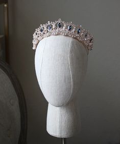 London blue accent stones & pearls, make this tiara a unique bridal accessory | wedding inspo, christmas themed wedding, dark fairytale wedding, wedding hair, wedding hairstyles ideas, wedding accessories, wedding jewelry and accessories, bridal tiara, bridal crown, bridal headpiece, headpieces for brides, christmas gift ideas, bridal gift ideas, bridal style, winter wedding inspo, 2023 wedding, glam bride, royal wedding ideas,princess bride #bridaltiara #christmasgiftideas #weddinghair #wed Rose Gold Tiara, Royal Ball, Crystal Bridal Tiaras, Silver Tiara, Beautiful Tiaras, Gold Tiara, Diamond Tiara, Blue Accent, Real Jewelry