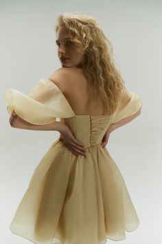 Introducing the Bertha Dress in elegant beige: a comfortable and stylish modern puff dress designed for those who love to dance and make a statement. This versatile dress features puff sleeves that can be worn on the shoulders for a classic look or dropped down to create an alluring off-shoulder style. The corset lacing at the back ensures a fully adjustable fit, providing both comfort and a customized silhouette. Crafted in a sophisticated beige hue, the Bertha Dress is perfect for a wide range Corset Lacing, Puff Sleeves Dress, Puff Dress, Corset Lace, Off Shoulder Fashion, Bridal Sash, Sleeves Dress, Art Dress, Short Wedding Dress