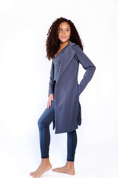 If you’re looking for The One, this is it. The Trinity Blazer is a statement of strength, innovation, and fearlessness, designed to empower you to unleash your true potential and rewrite the rules of your journey. Crafted from our luxurious Abundance Knit Fabric, this coat is designed to wear open, as a layering peice, with bold tuxedo-influenced tails, and convenient side pockets. Our Post-Consumer recycled fabrics are sweat wicking, fast drying, and antimicrobial (meaning anti-stink.) It keeps Yoga Democracy, The Trinity, Womens Activewear, Recycled Fabric, The Rules, Workout Clothes, Knit Fabric, Knitted Fabric, Layering