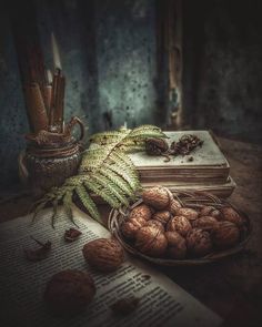 some nuts are sitting on top of a book