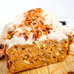 a piece of carrot cake with white frosting