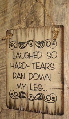 a wooden sign that says i taught so hard - tears ran down my leg on the wall