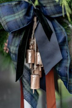 a close up of a christmas wreath with bells