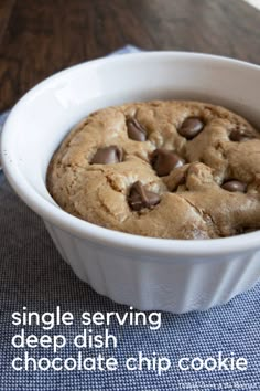 a white bowl filled with chocolate chip cookies