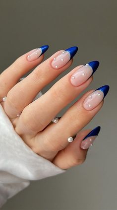 Modern French: Blue Tips with Pearl Studs for Summer 🌊💎 Nail Art Designs Blue French Tips, French Nail Art Blue, Trendy Dark Blue Nails, Navy Blue Gem Nails, Navy Pearl Nails, Blue Glitter Fade Nails, Winter Nails Ideas Blue, Navy Blue Nails Homecoming, Navy Blue Nails With Pearls