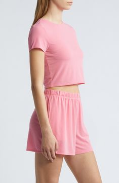 Cut from a lightweight, lightweight fabric with a softly ribbed texture, this cropped T-shirt takes your lounge game to the next level of comfort. 16 1/2" length (size Medium) Crewneck Short sleeves 59% polyester, 32% viscose, 9% spandex Machine wash, tumble dry Imported Trendy Cropped T-shirt For Spring Loungewear, Basic Ribbed Cropped T-shirt For Summer, Trendy Cropped T-shirt For Loungewear, Athleisure Crop Top T-shirt For Loungewear, Basic Stretch Cropped T-shirt For Loungewear, Casual Fitted Cropped T-shirt For Loungewear, Casual Ribbed Cropped Cotton T-shirt, Cropped Short Sleeve T-shirt For Summer Loungewear, Trendy Fitted Cropped T-shirt For Loungewear