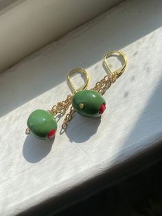 Handmade polymer clay and brass finish dangle earrings  Olive you  🫒❤️ Dangle Polymer Clay Single Earring, Dangle Single Earring Made Of Polymer Clay, Handmade Brass Clip-on Earrings For Gift, Unique Brass Clip-on Earrings For Gift, Green Lever Back Earrings As A Gift, Handmade Green Plug Earrings As Gift, Dangle Polymer Clay Earrings For Everyday, Dangle Earrings With Polymer Clay And Ear Wire, Dangle Earrings With Ear Wire In Polymer Clay