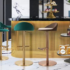 three stools in front of a bar with gold and green accents on the walls