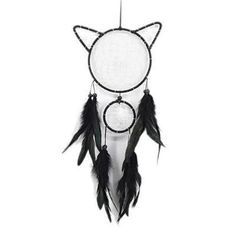 a black and white cat dream catcher with feathers