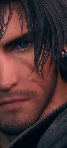 an image of a man with blue eyes and black hair looking at the camera,