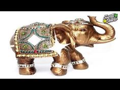 an elephant is decorated with jewels and beads