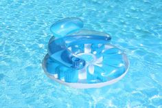 an inflatable device floating on top of a swimming pool