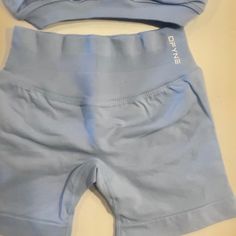 Dfyne Ice Blue Impact Shorts 4.5, No Bra, Shorts Only. I Had This Gifted To Me, Too Late To Return, They Ordered The Wrong Size. It Is Brand New Just Tried On Once. Have The Original Packaging And Receipt. Price Is Firm. Sperry Boat Shoes, Black Sweats, Blue C, Crop Blazer, Nike Running Shorts, Burberry Jacket, Brown Shorts, Lululemon Shorts, People Shopping