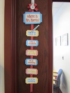 a door decorated with magnets that say where is mrs morress?