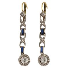 Art Deco style hanging gold earrings with diamonds and sapphires. Art Deco period hanging earrings with diamonds in old diamond and rose cuts with a total weight of over 0,55ct. Unique earrings additionally set with carre cut sapphires. Earrings made of 18-karat yellow gold and platinum elements. Origin: Western Europe, 1920s. Length: 3.7cm Weight: 3.68g. Elegant earrings will certainly appeal to fans and connoisseurs of the Art Deco style. Hanging Gold Earrings, Art Deco Stil, Estilo Art Deco, Art Deco Earrings, Art Deco Period, Western Europe, Hanging Earrings, Art Deco Style, Diamond Art