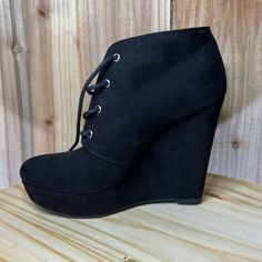 Nwt Cute Black Suede Bootie With High Platform Heel Casual Platform Lace-up Boots With Pointed Toe, Casual Synthetic High Heel Wedge Boots, Black Casual Closed Toe Wedge Boots, Casual Lace-up Wedge Boots With Reinforced Heel, Casual Black Ankle Wedge Boots, Casual Black Wedge Boots For Spring, Casual High Heel Wedge Boots For Party, Casual Black Ankle-high Wedge Boots, Casual Platform Booties For Party