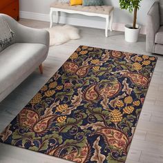 a blue and gold rug in a living room